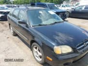 ✅ 2000 Suzuki Esteem GL • VIN: JS2GB41W1Y5184100 • Lot: 42607400. Wystawiony na IAAI z przebiegiem 119 892 mil. Bezpłatny archiwum sprzedaży aukcyjnych z USA i szczegółowy raport historii pojazdu na DreamBid. Zdjęcie 1.