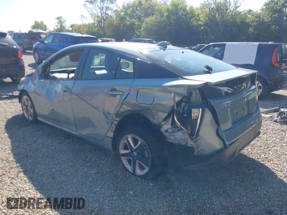 ✅ 2016 Toyota Prius Four • VIN: JTDKARFU4G3004551 • Lot: 43214616. Listed on IAAI with 185,688 mi. Free auction sales archive from the USA and detailed vehicle history report at DreamBid. Image 3.