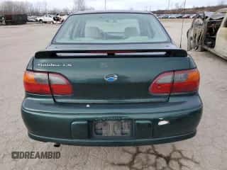 2003 Chevrolet Malibu LS z VIN 1G1NE52J33M603735, wystawiony jako Copart lot #41341645 z przebiegiem 125 052 mil mil oraz Szkoda całkowita • Salvage title. Historia ofert i sprzedaży dostępna na DreamBid. Obrazek 6.