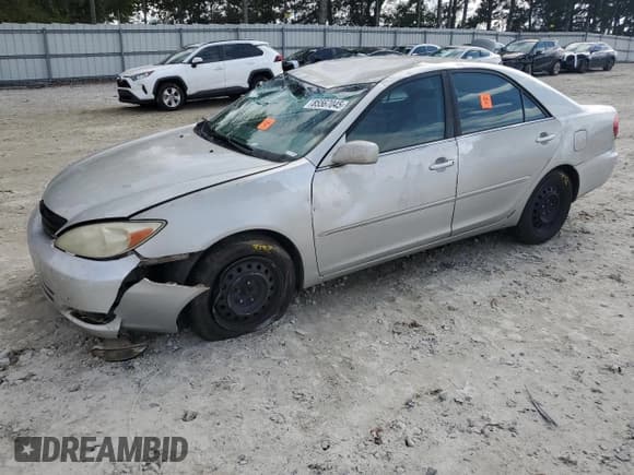 ✅ 2003 Toyota Camry XLE • VIN: 4T1BE30K33U245476 • Lot: 85567045. Listed on Copart with 220,260 mi. Free auction sales archive from the USA and detailed vehicle history report at DreamBid. Image 1.