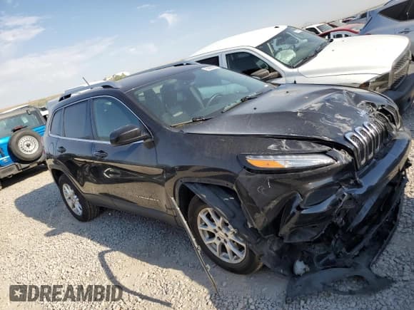 ✅ 2014 Jeep Cherokee Altitude • VIN: 1C4PJMCS1EW124461 • Lot: 62885365. Listed on Copart with 99,760 mi. Free auction sales archive from the USA and detailed vehicle history report at DreamBid. Image 4.