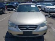 ✅ 2001 Nissan Maxima SE • VIN: JN1CA31D21T841656 • Lot: 42876639. Wystawiony na IAAI z przebiegiem 75 279 mil. Bezpłatny archiwum sprzedaży aukcyjnych z USA i szczegółowy raport historii pojazdu na DreamBid. Zdjęcie 6.