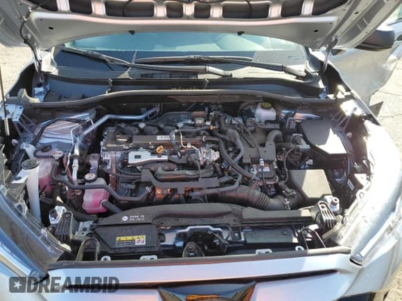 ✅ 2023 Toyota Corolla Cross Hybrid S • VIN: 7MUFBABG6PV005267 • Lot: 85154915. Listed on Copart with 10,524 mi. Free auction sales archive from the USA and detailed vehicle history report at DreamBid. Image 11.