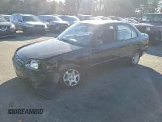 2005 Hyundai Accent GLS with VIN KMHCG45C15U662362, listed as a Copart auction lot 80574774 with 122,898 mi miles and Salvage title. Bid and sale history available at DreamBid. Image 1.
