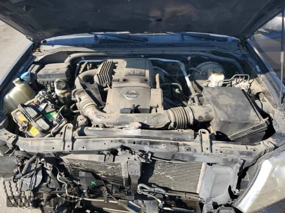 2015 Nissan Frontier SV z VIN 1N6AD0ER1FN716219, wystawiony jako Copart lot #89737555 z przebiegiem 97 252 mil mil oraz Szkoda całkowita • Salvage title. Historia ofert i sprzedaży dostępna na DreamBid. Obrazek 11.