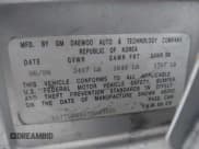 ✅ 2007 Chevrolet Aveo LS • VIN: KL1TD56667B049669 • Lot: 41989575. Wystawiony na IAAI z przebiegiem 73 710 mil. Bezpłatny archiwum sprzedaży aukcyjnych z USA i szczegółowy raport historii pojazdu na DreamBid. Zdjęcie 9.