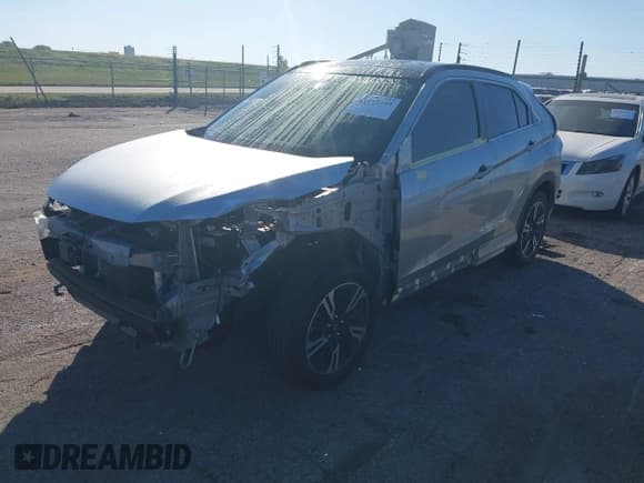 ✅ 2023 Mitsubishi Eclipse Cross SE • VIN: JA4ATWAA9PZ003999 • Lot: 43401250. Listed on IAAI with 32,213 mi. Free auction sales archive from the USA and detailed vehicle history report at DreamBid. Image 2.