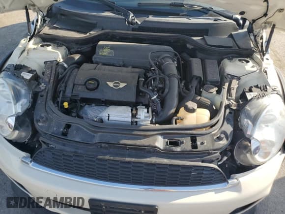 ✅ 2014 MINI Convertible S • VIN: WMWZP3C51ET707297 • Lot: 81437785. Wystawiony na Copart z przebiegiem 140 028 mil. Bezpłatny archiwum sprzedaży aukcyjnych z USA i szczegółowy raport historii pojazdu na DreamBid. Zdjęcie 11.