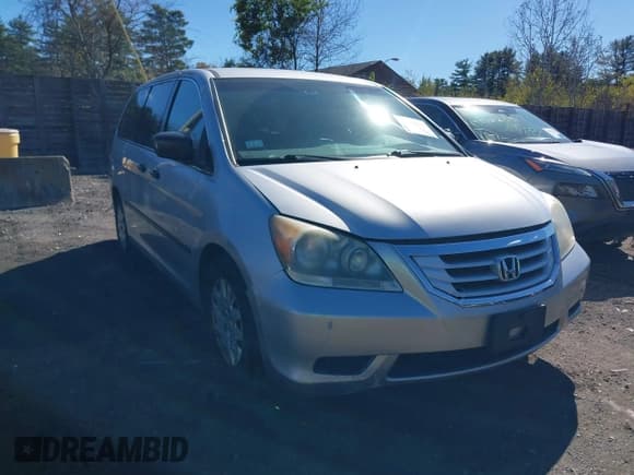 ✅ 2010 Honda Odyssey LX • VIN: 5FNRL3H23AB015696 • Lot: 43404697. Listed on IAAI with 195,124 mi. Free auction sales archive from the USA and detailed vehicle history report at DreamBid. Image 1.