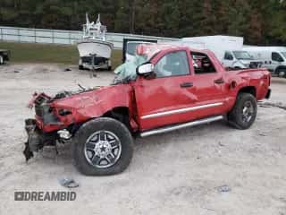 2005 Dodge Dakota Laramie с VIN 1D7HW58N55S194962, выставлен на аукционе Copart как лот 78866464 с пробегом Не указан миль и Списание • Salvage title. История ставок и продаж доступна на DreamBid. Изображение 1.