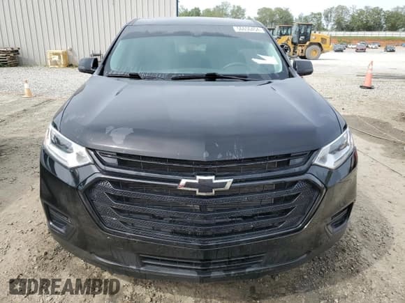 ✅ 2021 Chevrolet Traverse LS • VIN: 1GNEVFKW4MJ199623 • Lot: 58165924. Wystawiony na Copart z przebiegiem 49 999 mil. Bezpłatny archiwum sprzedaży aukcyjnych z USA i szczegółowy raport historii pojazdu na DreamBid. Zdjęcie 5.