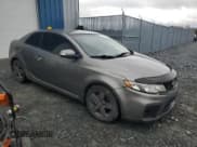 ✅ 2010 Kia Forte EX • VIN: KNAFU6A27A5106433 • Lot: 81853755. Listed on Copart with 266,671 mi. Free auction sales archive from the USA and detailed vehicle history report at DreamBid. Image 4.