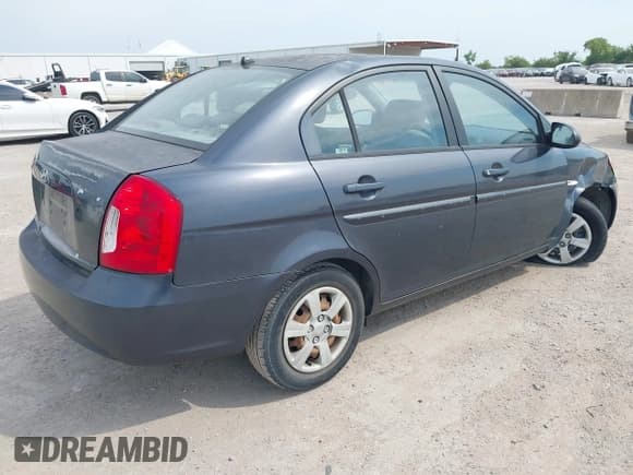 ✅ 2007 Hyundai Accent GLS • VIN: KMHCN46C77U121615 • Лот: 42948038. Опубликован ранее на IAAI с пробегом 159 388 миль. Бесплатный доступ к архиву аукционных продаж из США и подробный отчёт об истории автомобиля на DreamBid. Изображение 4.