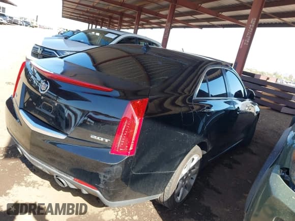 ✅ 2014 Cadillac ATS Standard RWD • VIN: 1G6AA5RX4E0103138 • Lot: 42273097. Listed on IAAI with 141,561 mi. Free auction sales archive from the USA and detailed vehicle history report at DreamBid. Image 4.