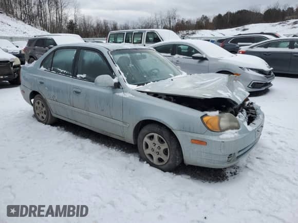 2005 Hyundai Accent GLS с VIN KMHCG45C05U605523, выставлен на аукционе Copart как лот 43811815 с пробегом 190 638 миль миль и Списание • Salvage title. История ставок и продаж доступна на DreamBid. Изображение 4.