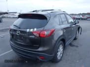 ✅ 2016 Mazda CX-5 Touring • VIN: JM3KE4CY5G0845575 • Lot: 43653030. Listed on IAAI with 79,795 mi. Free auction sales archive from the USA and detailed vehicle history report at DreamBid. Image 4.