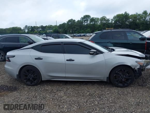 ✅ 2017 Nissan Maxima Platinum • VIN: 1N4AA6AP3HC415815 • Lot: 42670911. Listed on IAAI with 77,663 mi. Free auction sales archive from the USA and detailed vehicle history report at DreamBid. Image 13.