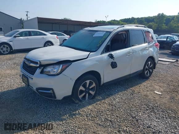 2018 Subaru Forester Limited with VIN JF2SJARC0JH430558, listed as a IAAI auction lot 42964541 with 87,996 mi miles and . Bid and sale history available at DreamBid. Image 2.