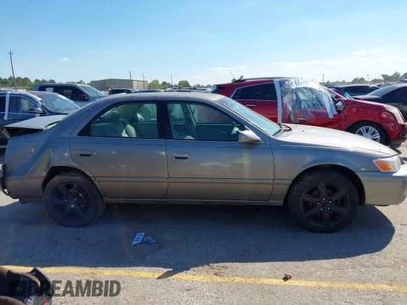 ✅ 2001 Toyota Camry LE • VIN: 4T1BG22K61U030253 • Lot: 43430952. Listed on IAAI with 319,972 mi. Free auction sales archive from the USA and detailed vehicle history report at DreamBid. Image 13.