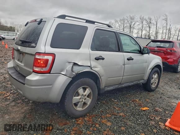 ✅ 2010 Ford Escape XLT • VIN: 1FMCU9D75AKC72493 • Lot: 95906505. Listed on Copart with 200,332 mi. Free auction sales archive from the USA and detailed vehicle history report at DreamBid. Image 3.