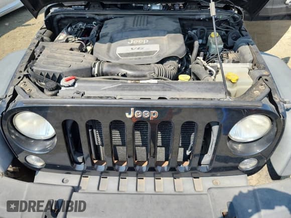 ✅ 2015 Jeep Wrangler Unlimited Freedom • VIN: 1C4HJWDG1FL521830 • Лот: 66394175. Опубликован ранее на Copart с пробегом 165 937 миль. Бесплатный доступ к архиву аукционных продаж из США и подробный отчёт об истории автомобиля на DreamBid. Изображение 12.