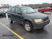 ✅ 2004 Ford Escape XLS • VIN: 1FMYU02144KA78820 • Lot: 43801327. Listed on IAAI with 164,391 mi. Free auction sales archive from the USA and detailed vehicle history report at DreamBid. Image 1.