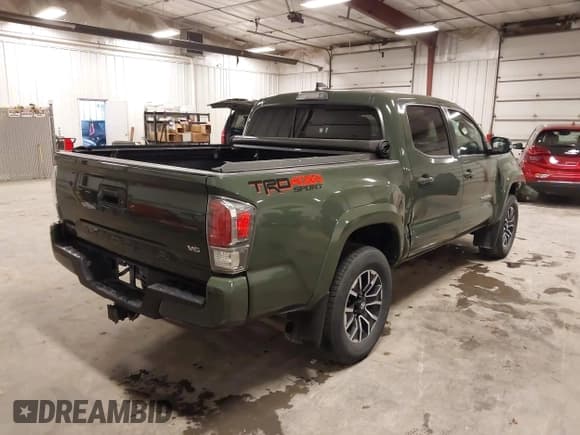 ✅ 2022 Toyota Tacoma SR • VIN: 3TMCZ5AN5NM519589 • Lot: 43634877. Listed on IAAI with 48,814 mi. Free auction sales archive from the USA and detailed vehicle history report at DreamBid. Image 4.