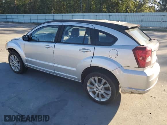 2011 Dodge Caliber Heat with VIN 1B3CB5HA1BD214462, listed as a Copart auction lot 75394274 with 176,495 mi miles and Salvage title. Bid and sale history available at DreamBid. Image 2.