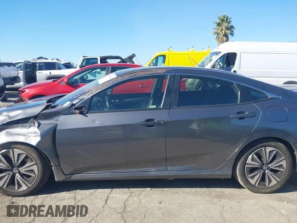 ✅ 2018 Honda Civic EX-T • VIN: JHMFC1F34JX008280 • Lot: 43809009. Listed on IAAI with 122,246 mi. Free auction sales archive from the USA and detailed vehicle history report at DreamBid. Image 14.
