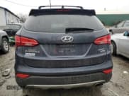 ✅ 2015 Hyundai Santa Fe • VIN: 5XYZUDLB1FG264718 • Лот: 82561063. Опубликован ранее на Copart с пробегом 122 760 миль. Бесплатный доступ к архиву аукционных продаж из США и подробный отчёт об истории автомобиля на DreamBid. Изображение 6.
