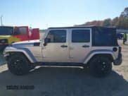 ✅ 2007 Jeep Wrangler Unlimited Sahara • VIN: 1J4GB59167L152708 • Lot: 43722971. Listed on IAAI with 215,920 mi. Free auction sales archive from the USA and detailed vehicle history report at DreamBid. Image 14.