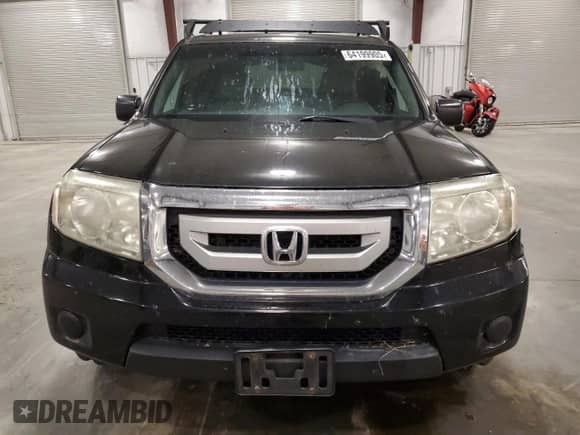 2010 Honda Pilot LX with VIN 5FNYF4H26AB031724, listed as a Copart auction lot 64199905 with 205,743 mi miles and Salvage title. Bid and sale history available at DreamBid. Image 5.