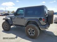 ✅ 2021 Jeep Wrangler Sport • VIN: 1C4GJXAN2MW718456 • Lot: 55974445. Listed on Copart with 50,911 mi. Free auction sales archive from the USA and detailed vehicle history report at DreamBid. Image 2.