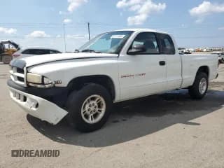 ✅ 1999 Dodge Dakota SLT • VIN: 1B7GL22Y0XS285043 • Lot: 67111865. Wystawiony na Copart z przebiegiem 145 209 mil. Bezpłatny archiwum sprzedaży aukcyjnych z USA i szczegółowy raport historii pojazdu na DreamBid. Zdjęcie 1.
