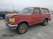 ✅ 1989 Ford Bronco Eddie Bauer • VIN: 1FMEU15N4KLA87239 • Lot: 82328135. Listed on Copart with 412 mi. Free auction sales archive from the USA and detailed vehicle history report at DreamBid. Image 1.