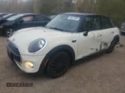 ✅ 2019 MINI Hardtop 4 Door Cooper • VIN: WMWXU1C51K2J02427 • Lot: 86431505. Listed on Copart with 104,408 mi. Free auction sales archive from the USA and detailed vehicle history report at DreamBid. Image 1.