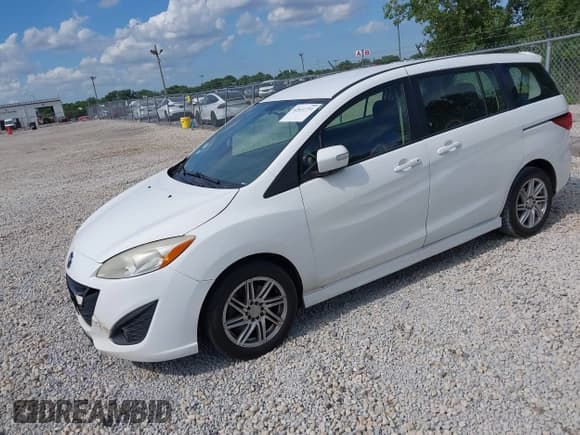 ✅ 2013 Mazda 5 Touring • VIN: JM1CW2CL5D0152097 • Lot: 42611731. Listed on IAAI with 230,179 mi. Free auction sales archive from the USA and detailed vehicle history report at DreamBid. Image 2.