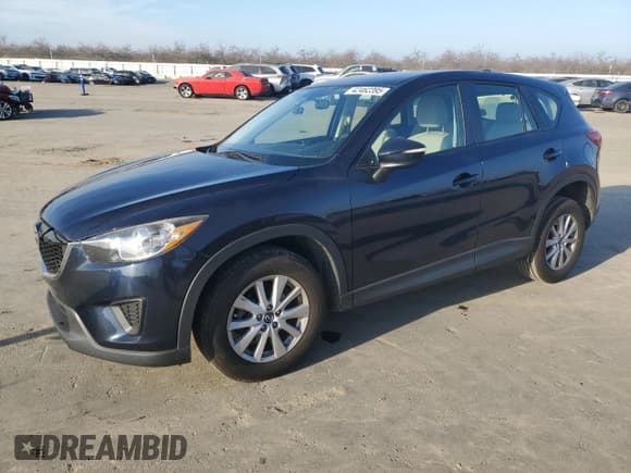 ✅ 2015 Mazda CX-5 Sport • VIN: JM3KE2BE6F0491107 • Lot: 42462395. Listed on Copart with 82,528 mi. Free auction sales archive from the USA and detailed vehicle history report at DreamBid. Image 1.