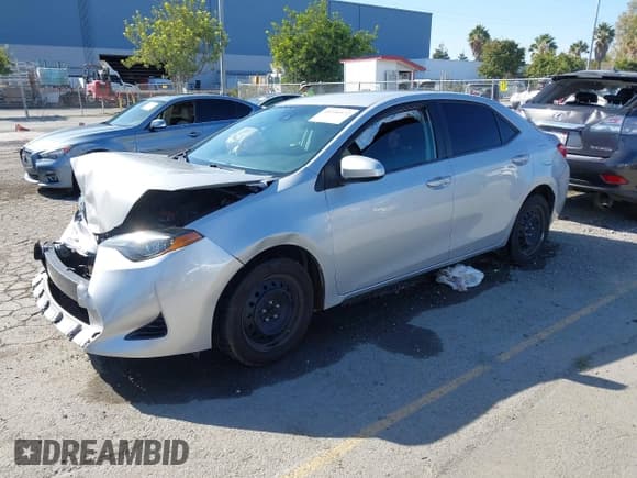 ✅ 2018 Toyota Corolla LE • VIN: 5YFBURHE5JP815206 • Lot: 43530572. Listed on IAAI with 83,437 mi. Free auction sales archive from the USA and detailed vehicle history report at DreamBid. Image 2.