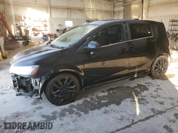 2020 Chevrolet Sonic Premier with VIN 1G1JF6SB9L4100446, listed as a Copart auction lot 87485154 with 84,883 mi miles and Salvage title. Bid and sale history available at DreamBid. Image 1.