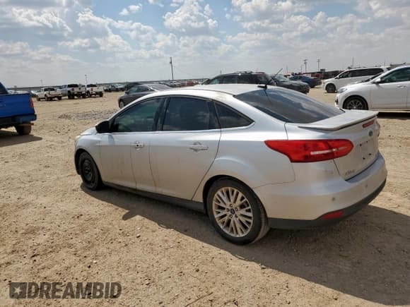 ✅ 2017 Ford Focus Titanium • VIN: 1FADP3J20HL288181 • Лот: 80854745. Опубликован ранее на Copart с пробегом 151 194 миль. Бесплатный доступ к архиву аукционных продаж из США и подробный отчёт об истории автомобиля на DreamBid. Изображение 2.