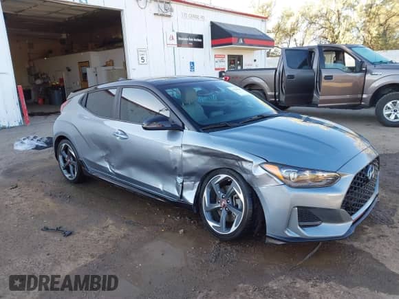 2020 Hyundai Veloster Turbo R-Spec z VIN KMHTH6AB5LU026515, wystawiony jako IAAI lot #43278624 z przebiegiem 48 888 mil mil oraz . Historia ofert i sprzedaży dostępna na DreamBid. Obrazek 1.