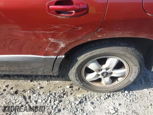 ✅ 2005 Hyundai Santa Fe GLS • VIN: KM8SC13DX5U878762 • Lot: 42255565. Listed on IAAI with 184,289 mi. Free auction sales archive from the USA and detailed vehicle history report at DreamBid. Image 6.