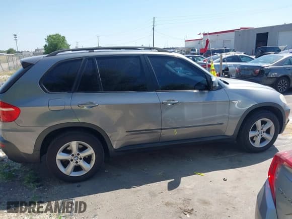 ✅ 2007 BMW X5 3.0si • VIN: 5UXFE43557L013764 • Лот: 42506107. Опубликован ранее на IAAI с пробегом 164 462 миль. Бесплатный доступ к архиву аукционных продаж из США и подробный отчёт об истории автомобиля на DreamBid. Изображение 13.