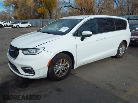 ✅ 2023 Chrysler Pacifica Touring • VIN: 2C4RC1FG5PR610811 • Lot: 43733563. Listed on IAAI with 55,492 mi. Free auction sales archive from the USA and detailed vehicle history report at DreamBid. Image 2.