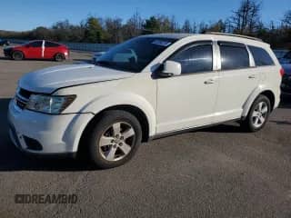 2012 Dodge Journey SXT с VIN 3C4PDDBG5CT216387, выставлен на аукционе Copart как лот 87092715 с пробегом 154 951 миль миль и Чистый • Clean title. История ставок и продаж доступна на DreamBid. Изображение 1.