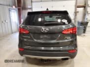✅ 2014 Hyundai Santa Fe • VIN: 5XYZTDLB9EG131917 • Лот: 91025625. Опубликован ранее на Copart с пробегом 68 449 миль. Бесплатный доступ к архиву аукционных продаж из США и подробный отчёт об истории автомобиля на DreamBid. Изображение 6.