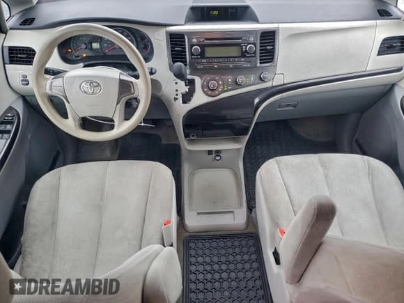 ✅ 2013 Toyota Sienna L • VIN: 5TDZK3DC8DS336697 • Lot: 94212395. Listed on Copart with 186,984 mi. Free auction sales archive from the USA and detailed vehicle history report at DreamBid. Image 8.