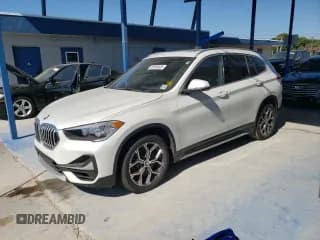 ✅ 2021 BMW X1 xDrive28i • VIN: WBXJG9C08M3M77833 • Lot: 92465635. Listed on Copart with 51,153 mi. Free auction sales archive from the USA and detailed vehicle history report at DreamBid. Image 1.