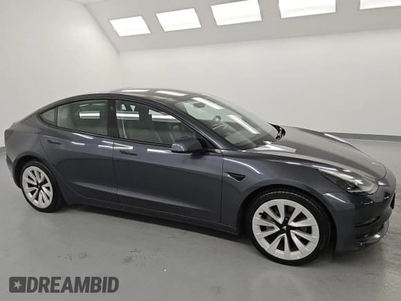 ✅ 2023 Tesla Model 3 • VIN: 5YJ3E1EA3PF459640 • Лот: 61107195. Опубликован ранее на Copart с пробегом 141 027 миль. Бесплатный доступ к архиву аукционных продаж из США и подробный отчёт об истории автомобиля на DreamBid. Изображение 4.